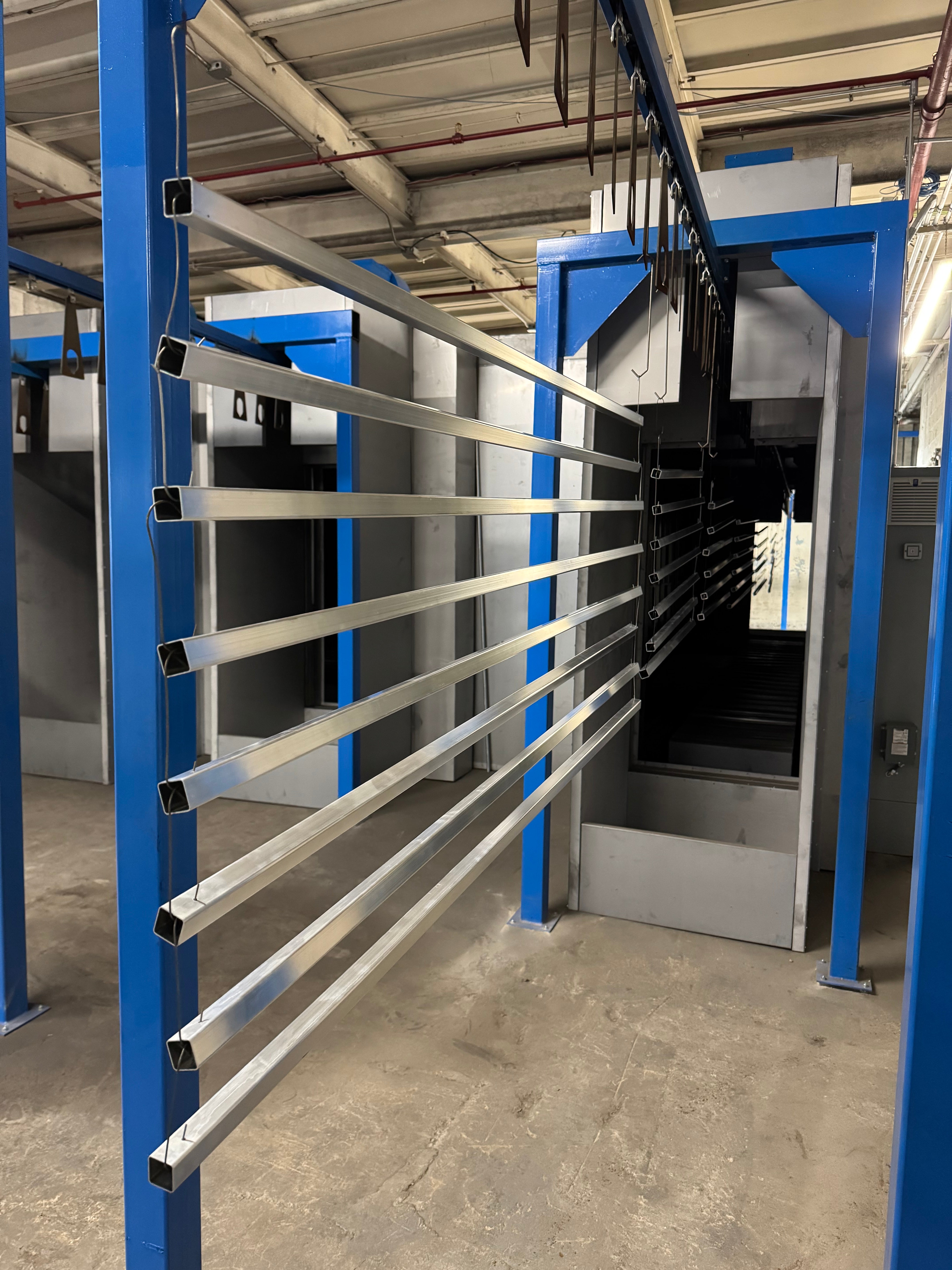 NJ Powder Coating line photo with 144in long 12 ft extrusion